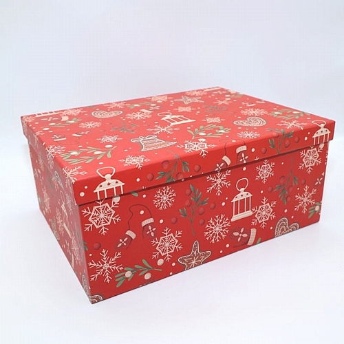 Χριστουγεννιάτικο κόκκινο κουτί με εικονιζόμενες καμπανούλες, χιονονιφάδες μπισκοτάκια